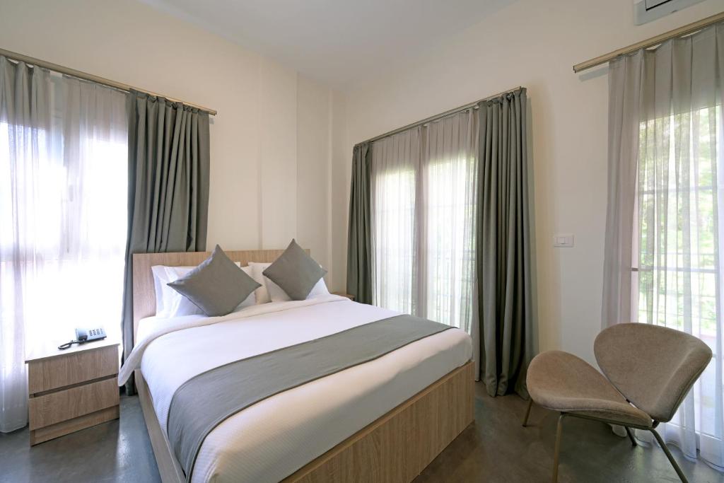 Postel nebo postele na pokoji v ubytování Comfy apart hotel