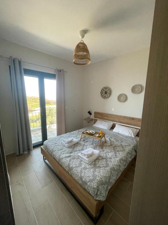 Postel nebo postele na pokoji v ubytování Loris’House