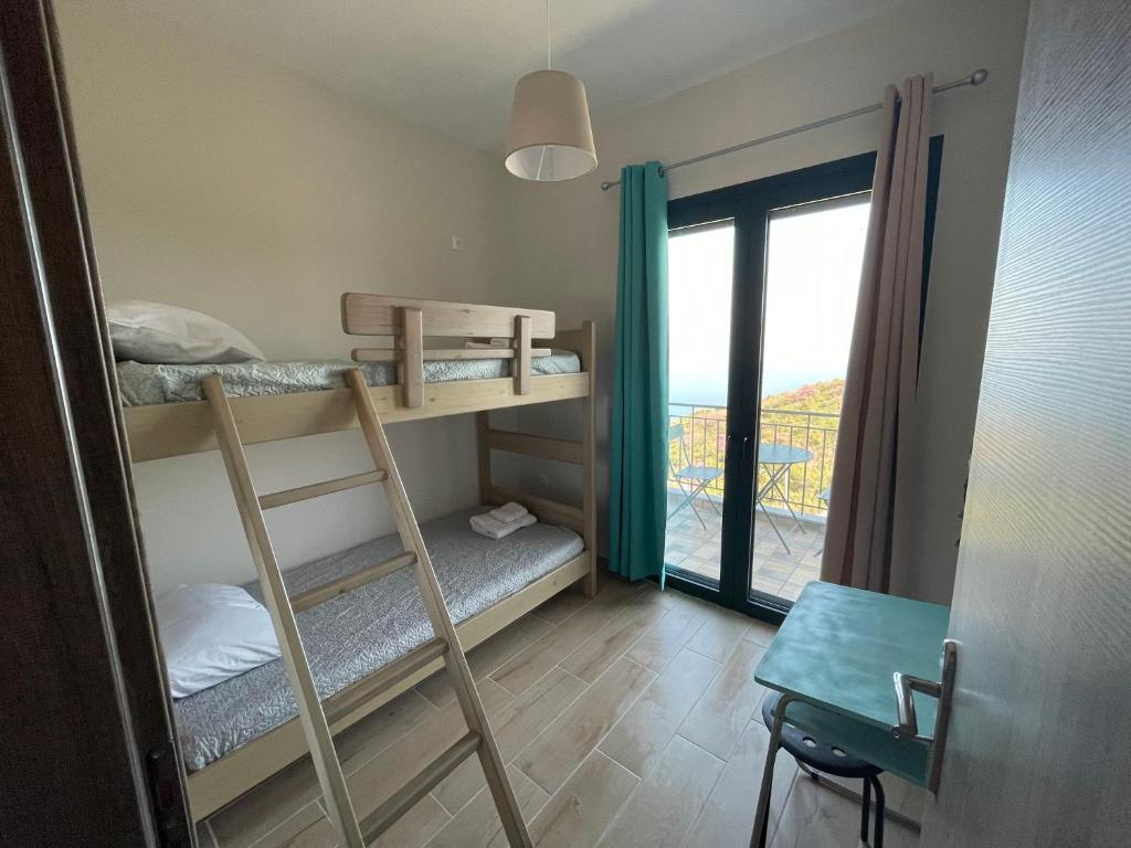 Postel nebo postele na pokoji v ubytování Loris’House