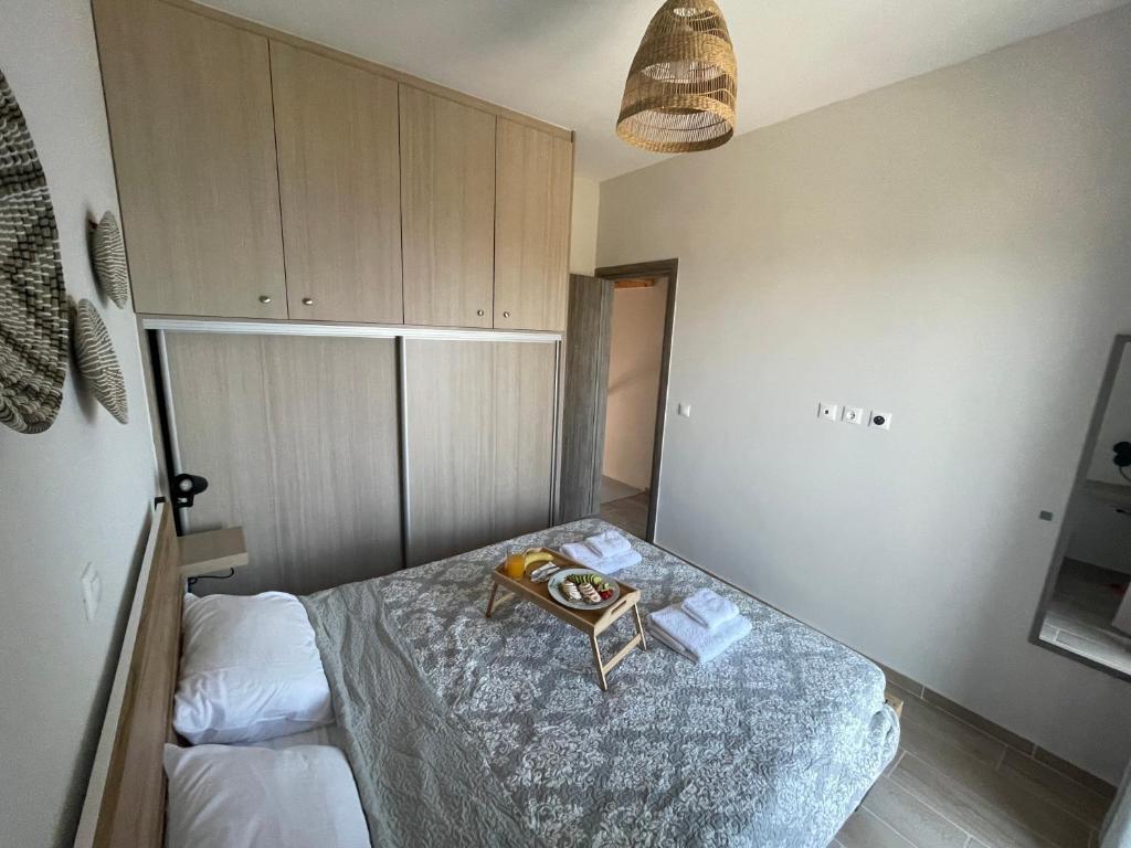 Postel nebo postele na pokoji v ubytování Loris’House