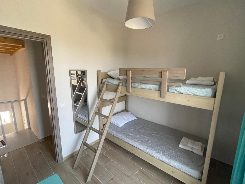 Postel nebo postele na pokoji v ubytování Loris’House