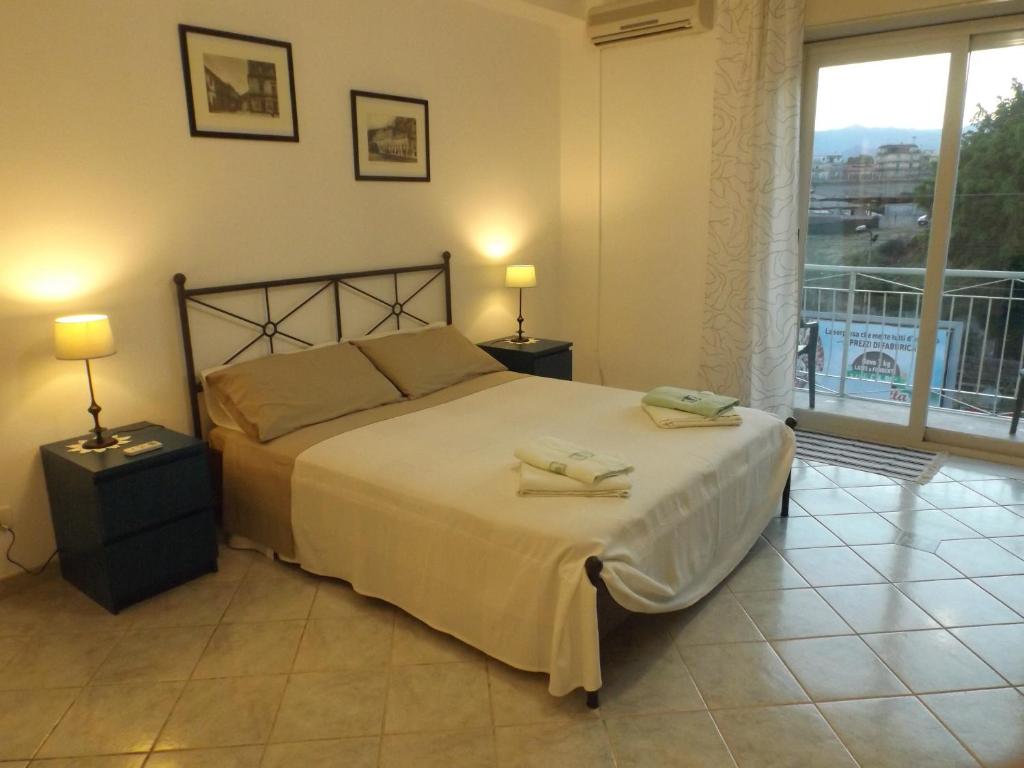 Кровать или кровати в номере "I Cutulisci" Apartment