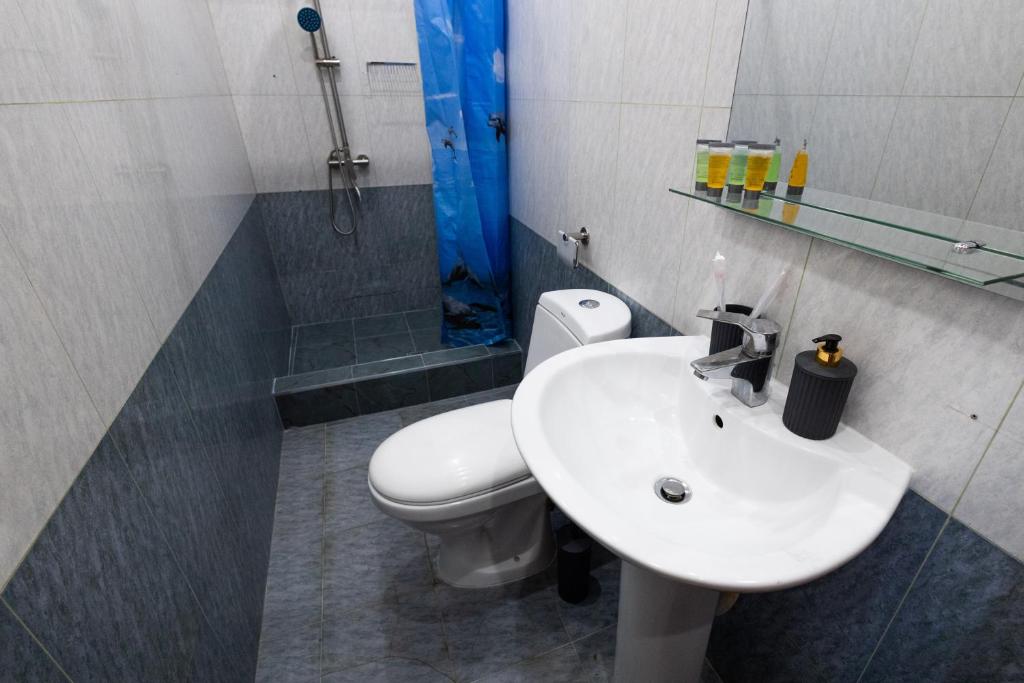Koupelna v ubytování YAN HOTEL