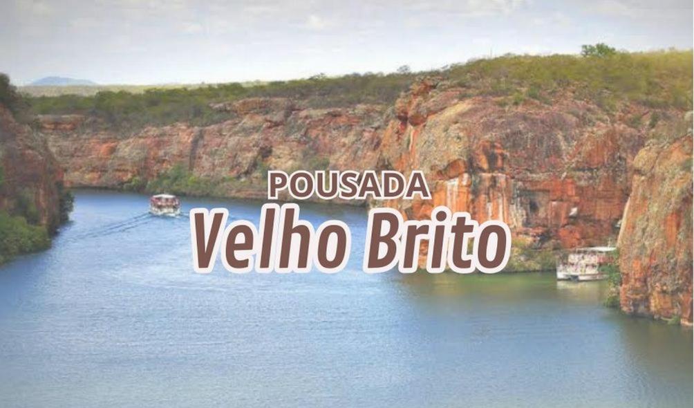 a view of a river with boats in the water at Pousada Velho Brito in Piranhas