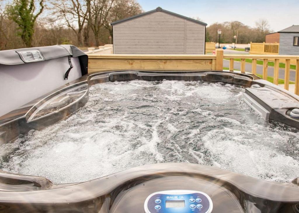 a plunge pool with water in a backyard at Arran Hills in Kilwinning