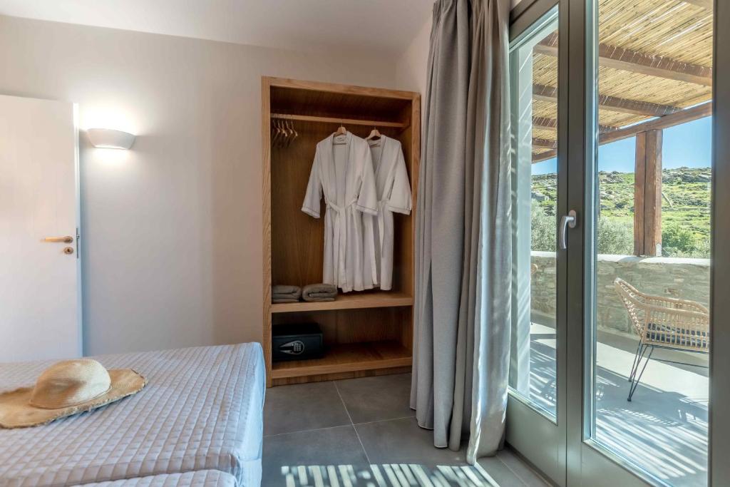 Postel nebo postele na pokoji v ubytování Ktima Drilli - Experience the authentic Naxian lifestyle