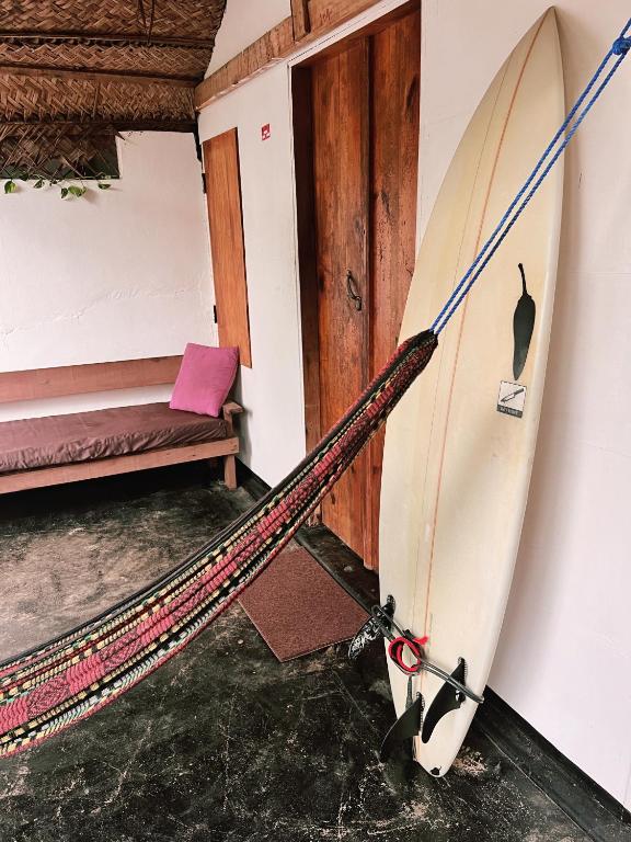 Postel nebo postele na pokoji v ubytování Wave Hunters