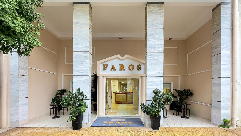 a front door of a store with a sign that reads francos at Faros II in Piraeus