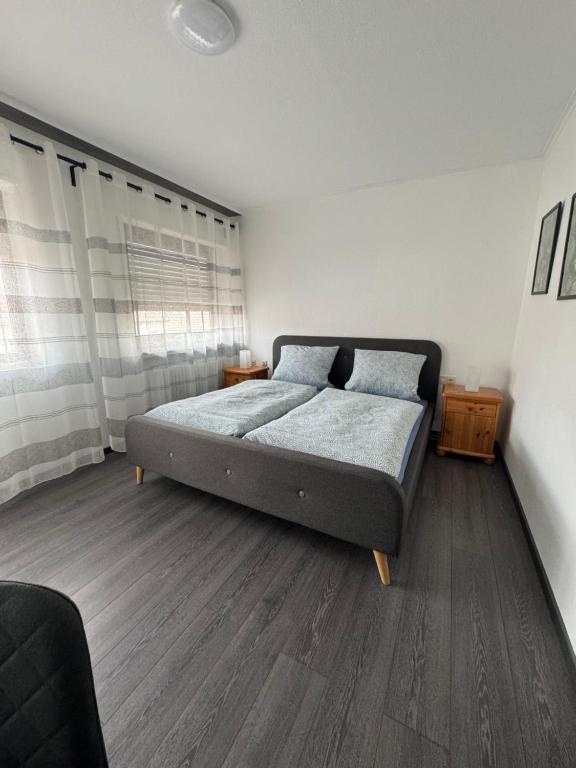 Postel nebo postele na pokoji v ubytování Gästehaus Zur Schmiede
