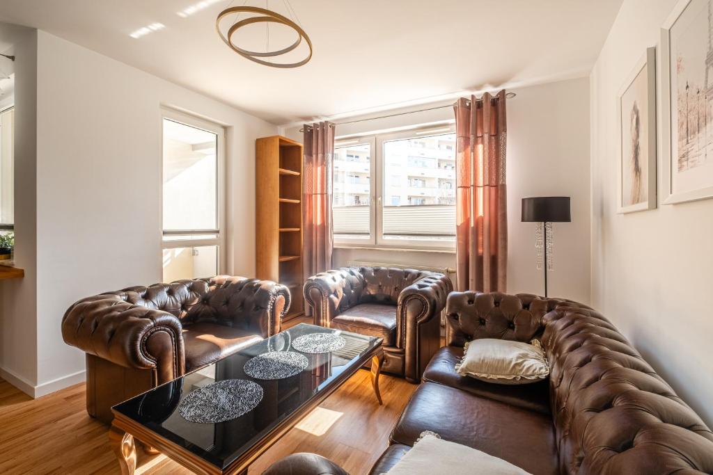 Posezení v ubytování Kaskada Apartament with balcony by Axel