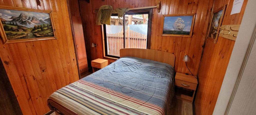Postel nebo postele na pokoji v ubytování Cabañas Buen Recuerdo