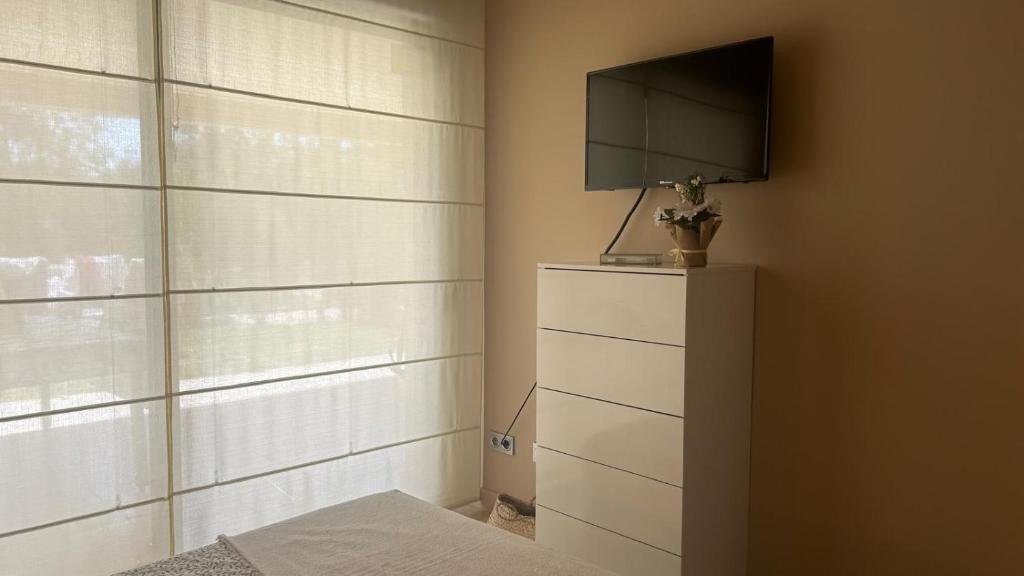 Televízia a/alebo spoločenská miestnosť v ubytovaní luxury homes apt valle del este resort, vera, garrucha,mojacar