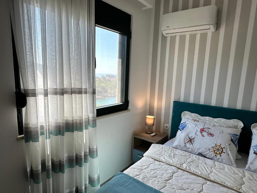 Postel nebo postele na pokoji v ubytování White Star Apartments