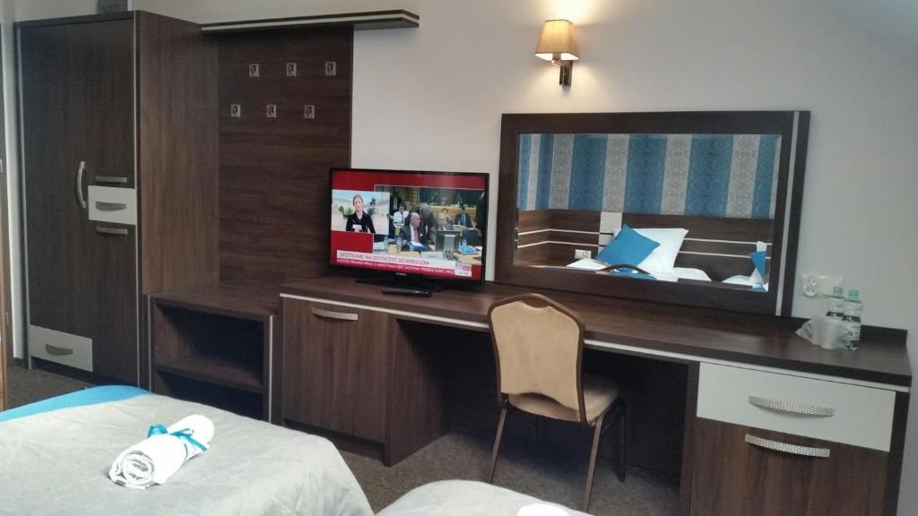 Posteľ alebo postele v izbe v ubytovaní Hotel Impressa