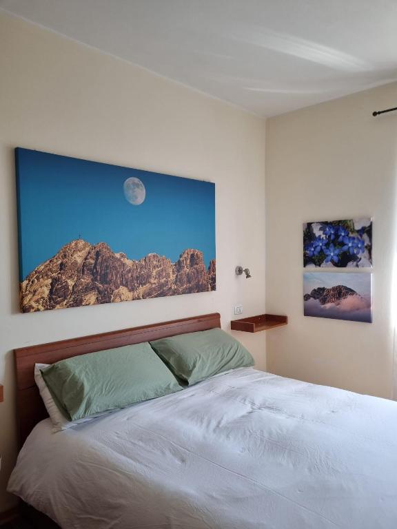 A bed or beds in a room at MUN Apartment - Major Unforgettable Nights