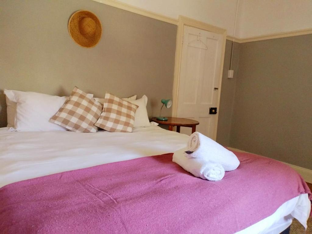 Ένα ή περισσότερα κρεβάτια σε δωμάτιο στο Riverview Country Inn