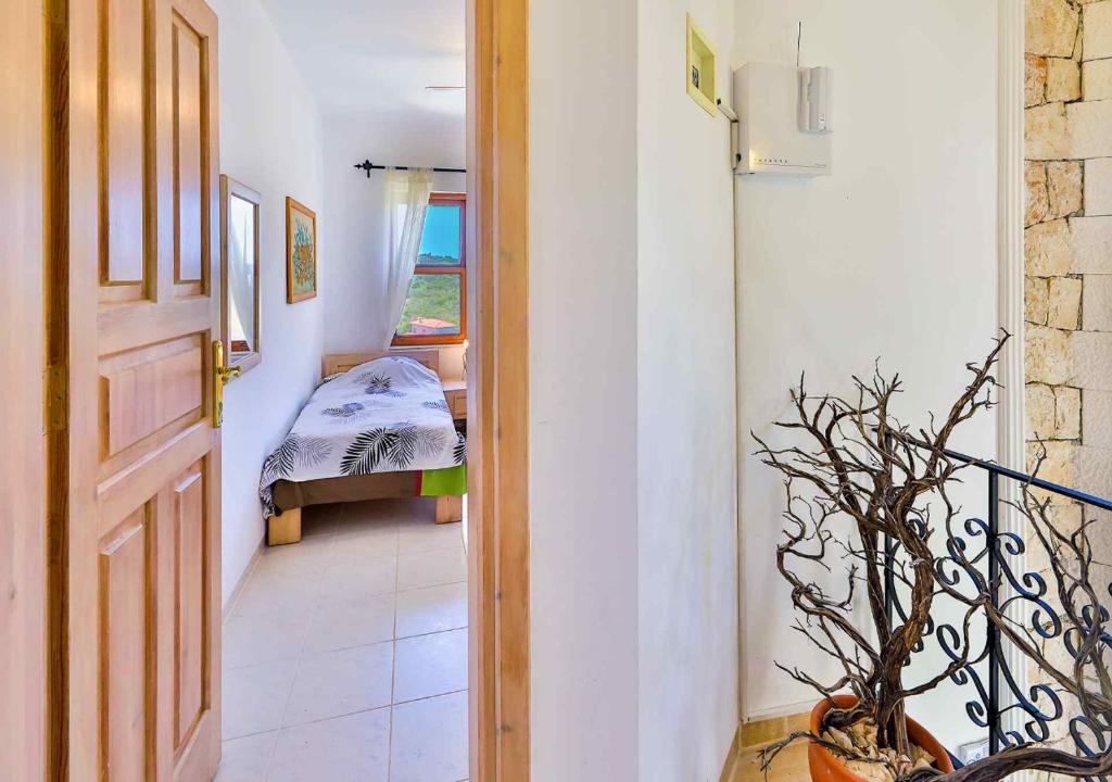 Postel nebo postele na pokoji v ubytování Yarımada Deniz Manzaralı Villa Cindy