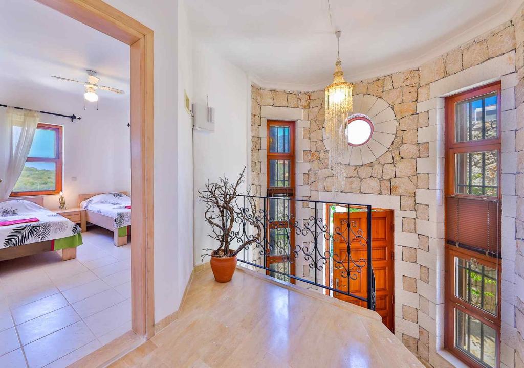 Postel nebo postele na pokoji v ubytování Yarımada Deniz Manzaralı Villa Cindy