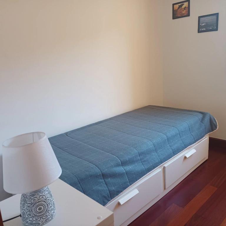 Postel nebo postele na pokoji v ubytování Complexo Vulcânico
