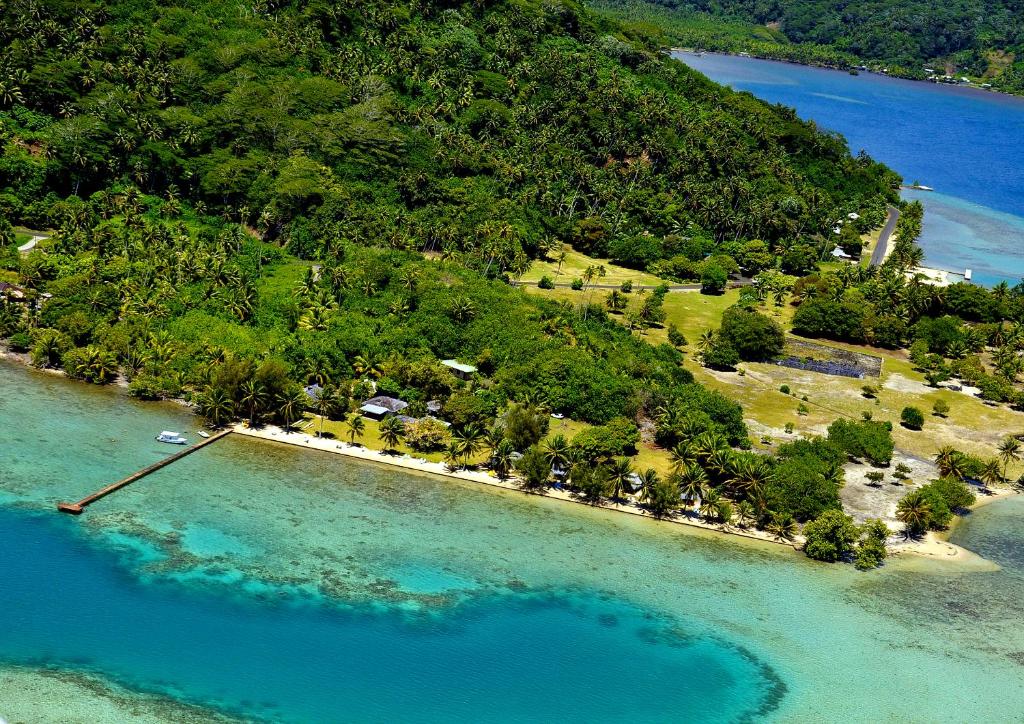 an aerial view of an island in the water at Hôtel Atiapiti in Opoa