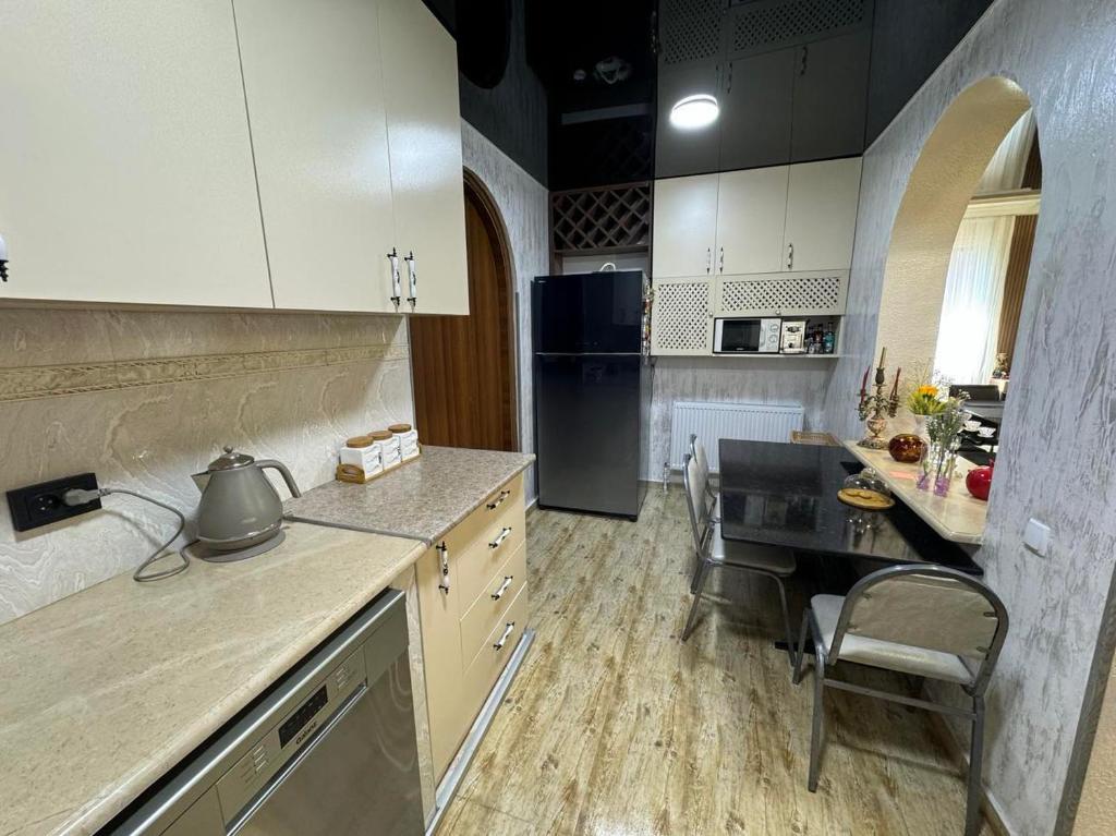 Kuchyň nebo kuchyňský kout v ubytování Ios Guest House