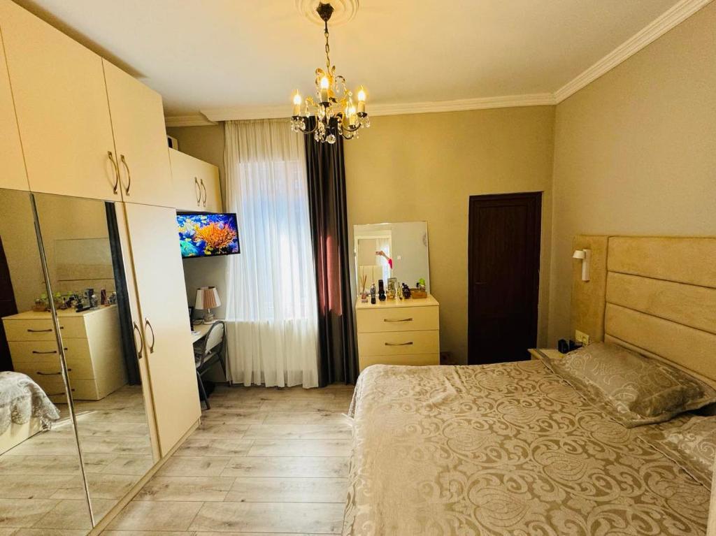 Postel nebo postele na pokoji v ubytování Ios Guest House