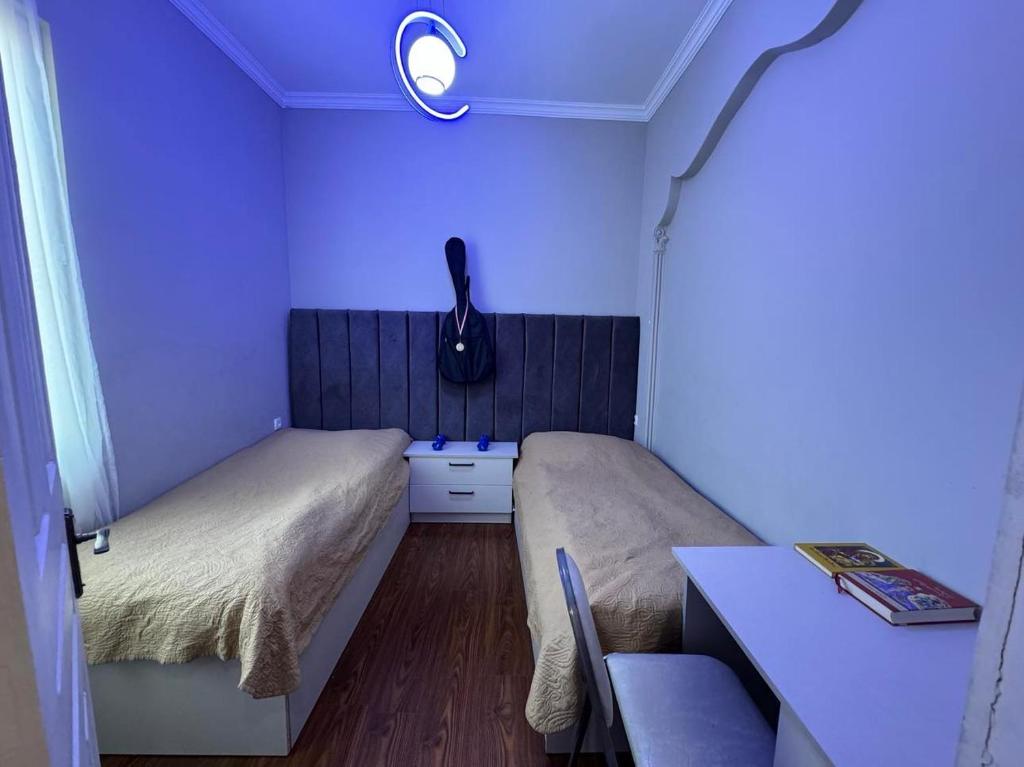 Postel nebo postele na pokoji v ubytování Ios Guest House