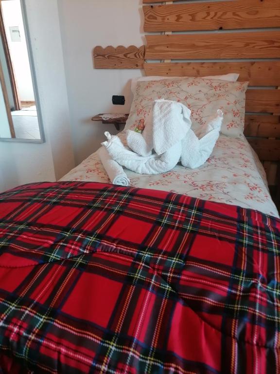 Postel nebo postele na pokoji v ubytování Ca ad Me Pare Alloggio con terrazza panoramica solarium