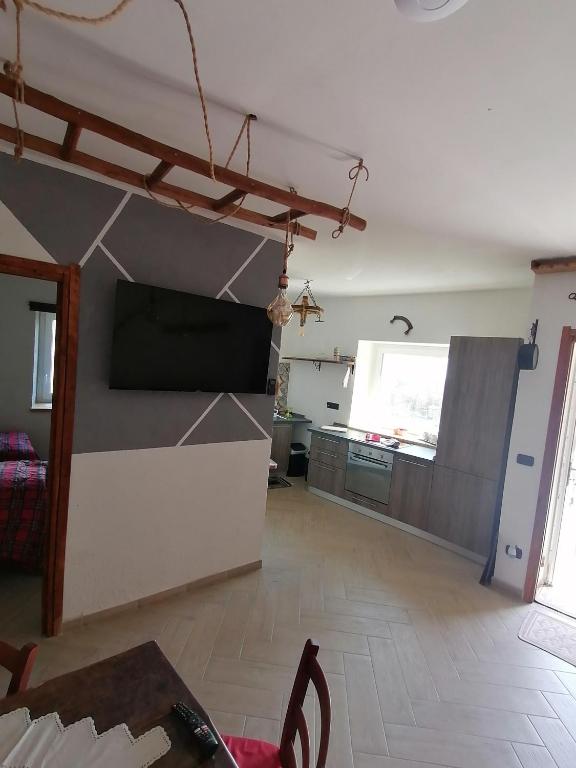 Kuchyň nebo kuchyňský kout v ubytování Ca ad Me Pare Alloggio con terrazza panoramica solarium
