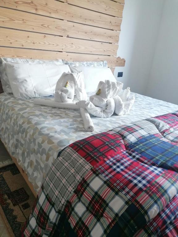 Postel nebo postele na pokoji v ubytování Ca ad Me Pare Alloggio con terrazza panoramica solarium