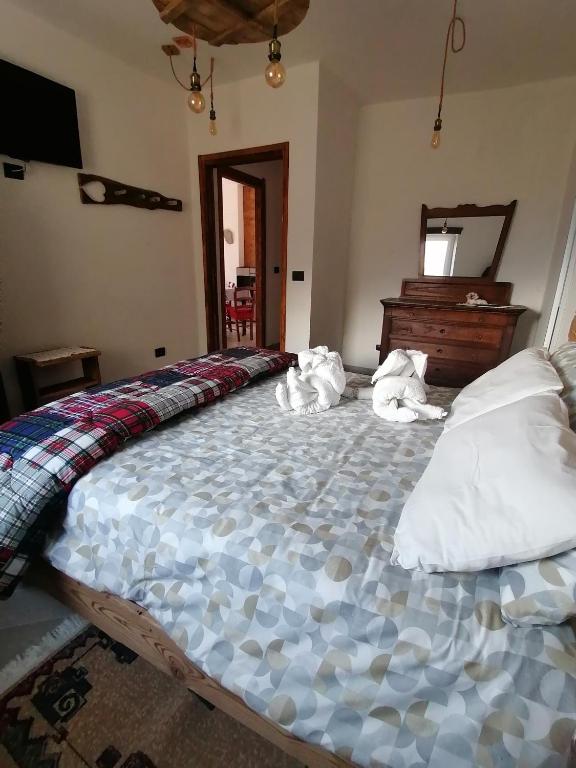 Postel nebo postele na pokoji v ubytování Ca ad Me Pare Alloggio con terrazza panoramica solarium