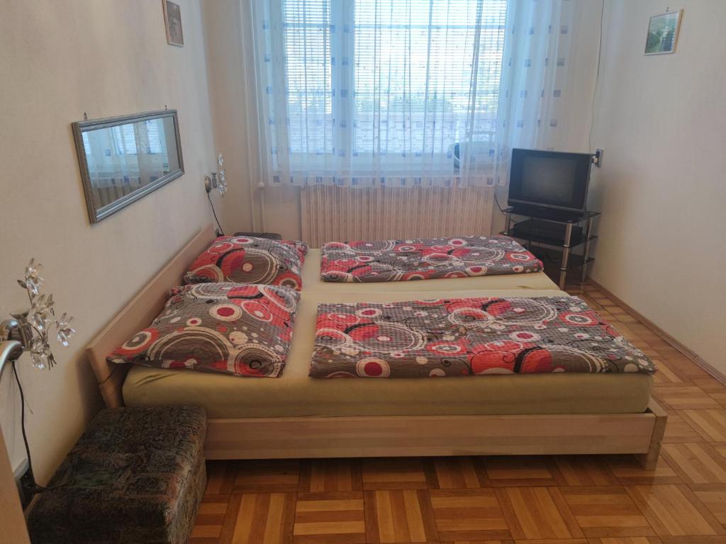 Postel nebo postele na pokoji v ubytování Apartmán Modré z nebe