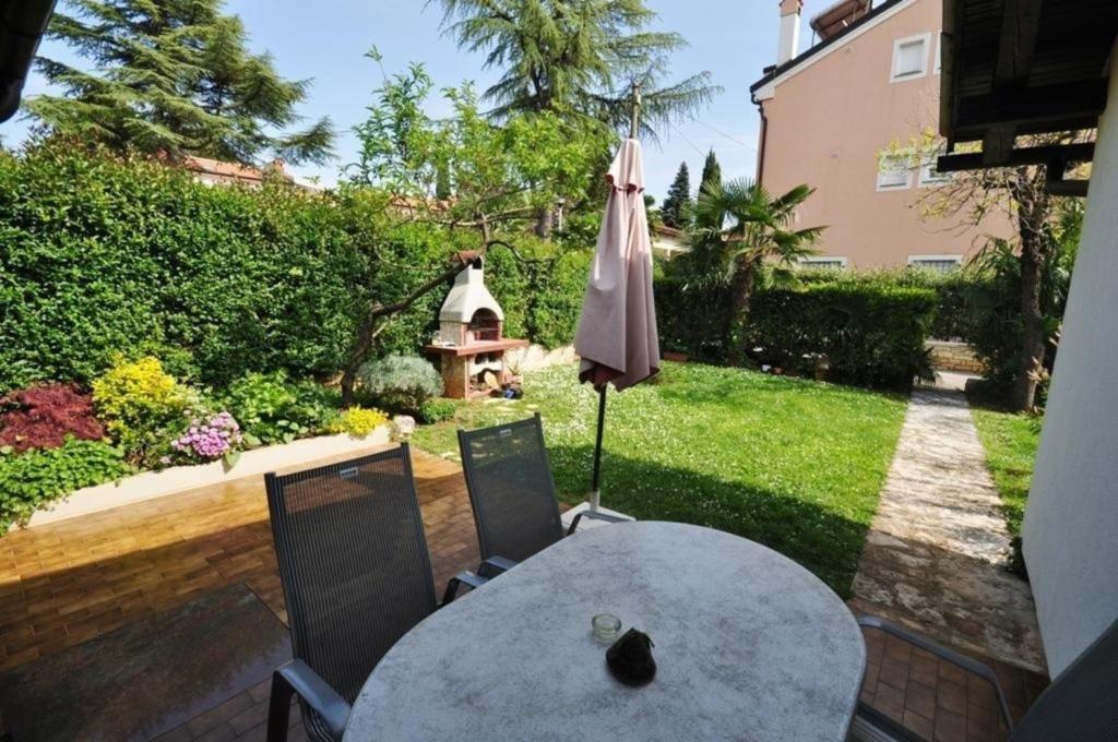 O grădină în afara Ferienwohnung für 4 Personen ca 40 m in Novigrad, Adriaküste Kroatien Westküste von Istrien
