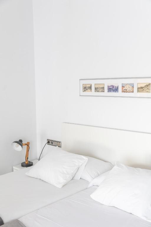 Postel nebo postele na pokoji v ubytování Mazi Apartments Colón