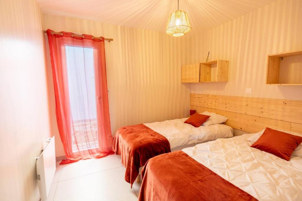 Postel nebo postele na pokoji v ubytování gîte Opaline - Ambleteuse