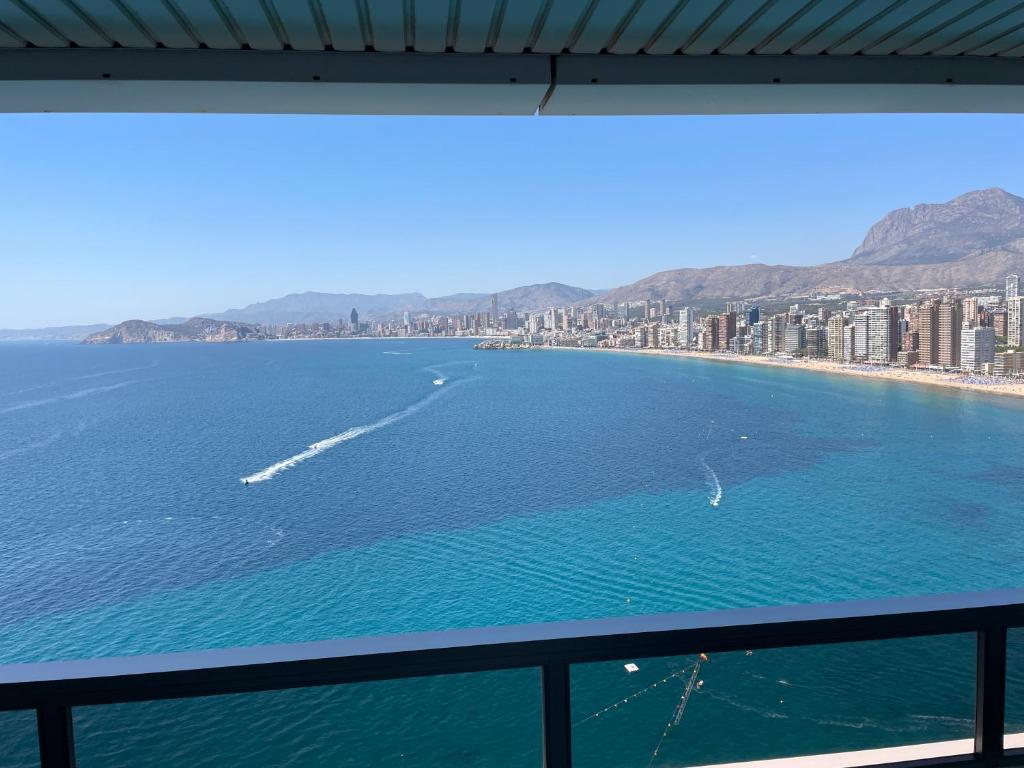 a view of the ocean from a balcony at Apartamentos Benivistas in Benidorm