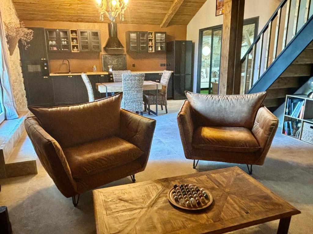 Posezení v ubytování La cave de Grand Cabane