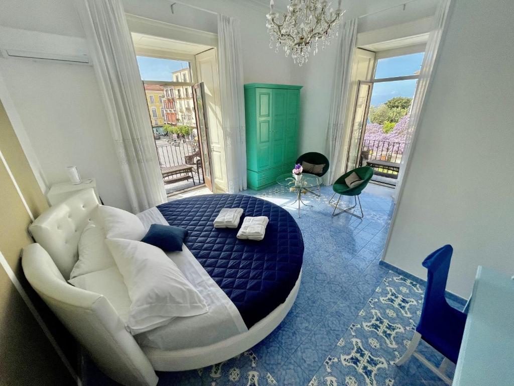Postel nebo postele na pokoji v ubytování Ambasciata Sorrento Relais