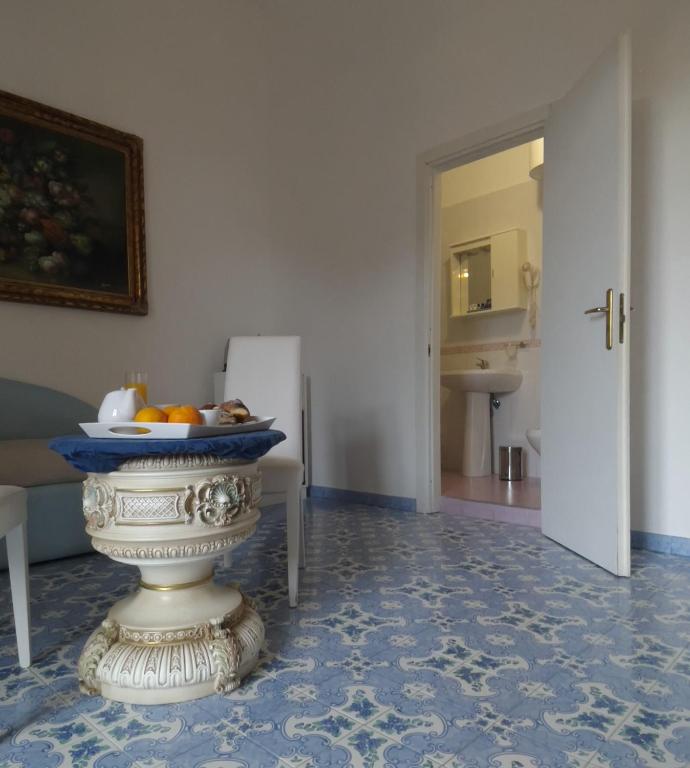 Kuchyň nebo kuchyňský kout v ubytování Ambasciata Sorrento Relais