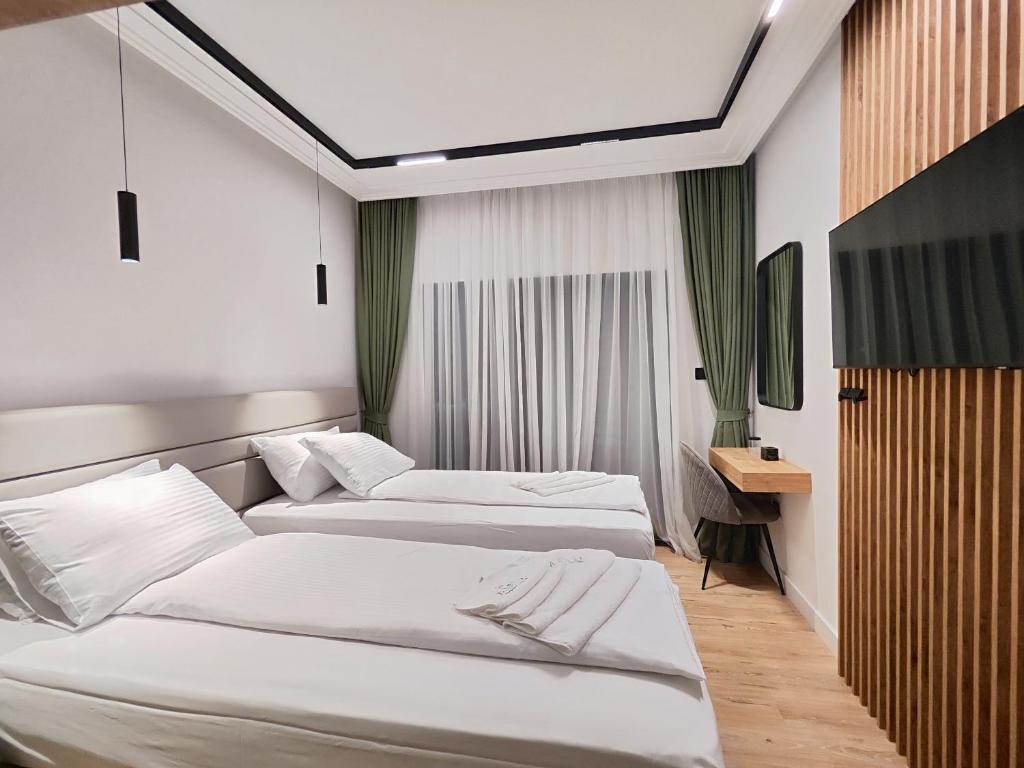 Postel nebo postele na pokoji v ubytování AMD Premium rooms Budva