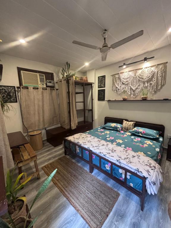 a bedroom with a bed in a room at Anavrin Art House in New Delhi