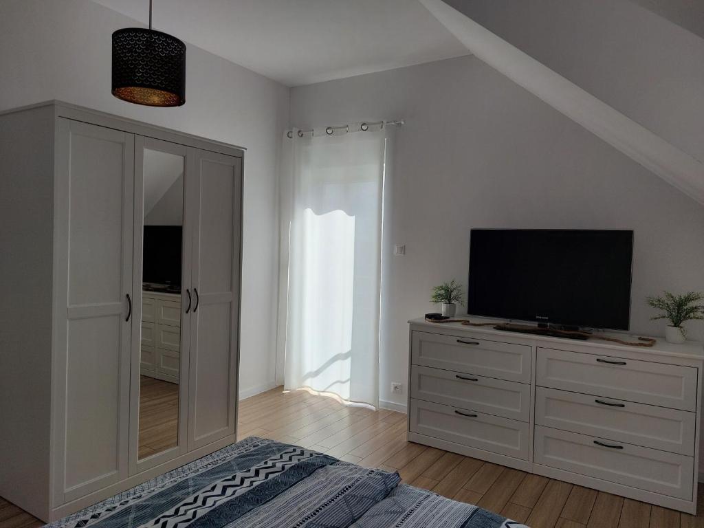 TV a/nebo společenská místnost v ubytování Holiday Home Mierki