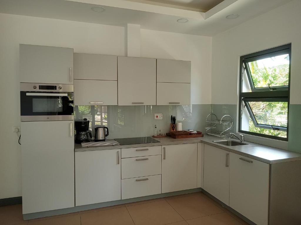 Kuchyň nebo kuchyňský kout v ubytování ISLA HOLIDAY HOME