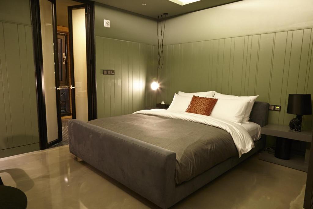 Postel nebo postele na pokoji v ubytování Hotel Lacky Daejeon