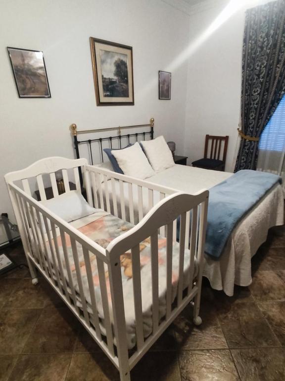 Posteľ alebo postele v izbe v ubytovaní Entretorres. Casa-dúplex en centro histórico.
