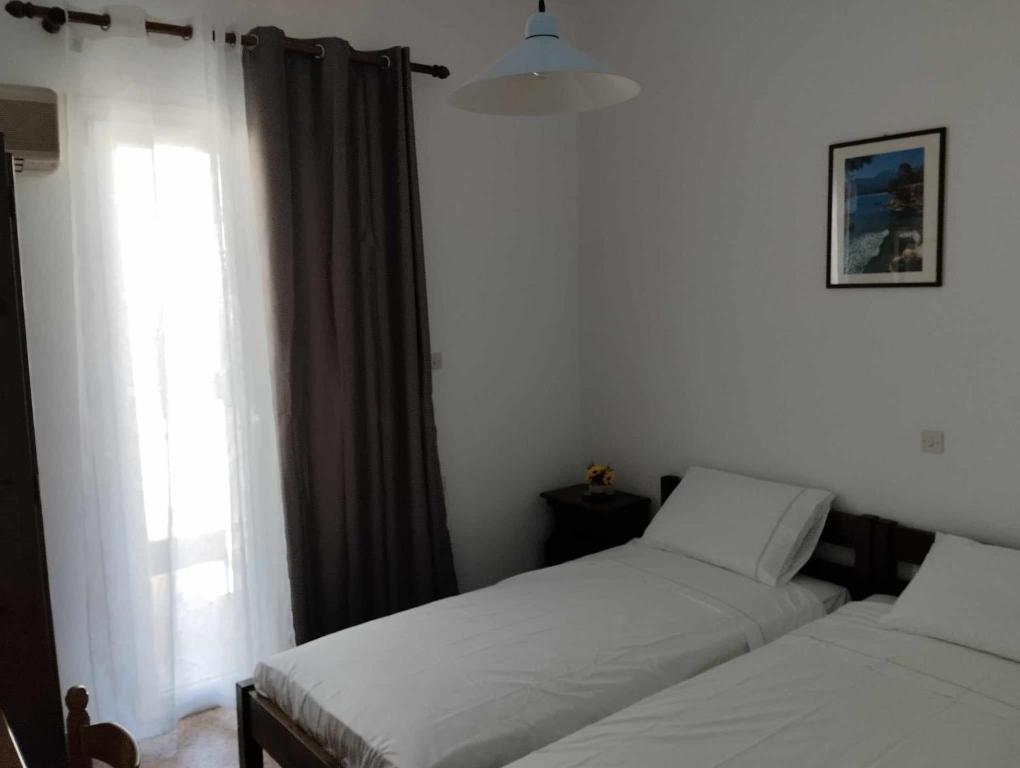 Ένα ή περισσότερα κρεβάτια σε δωμάτιο στο Amethyst room