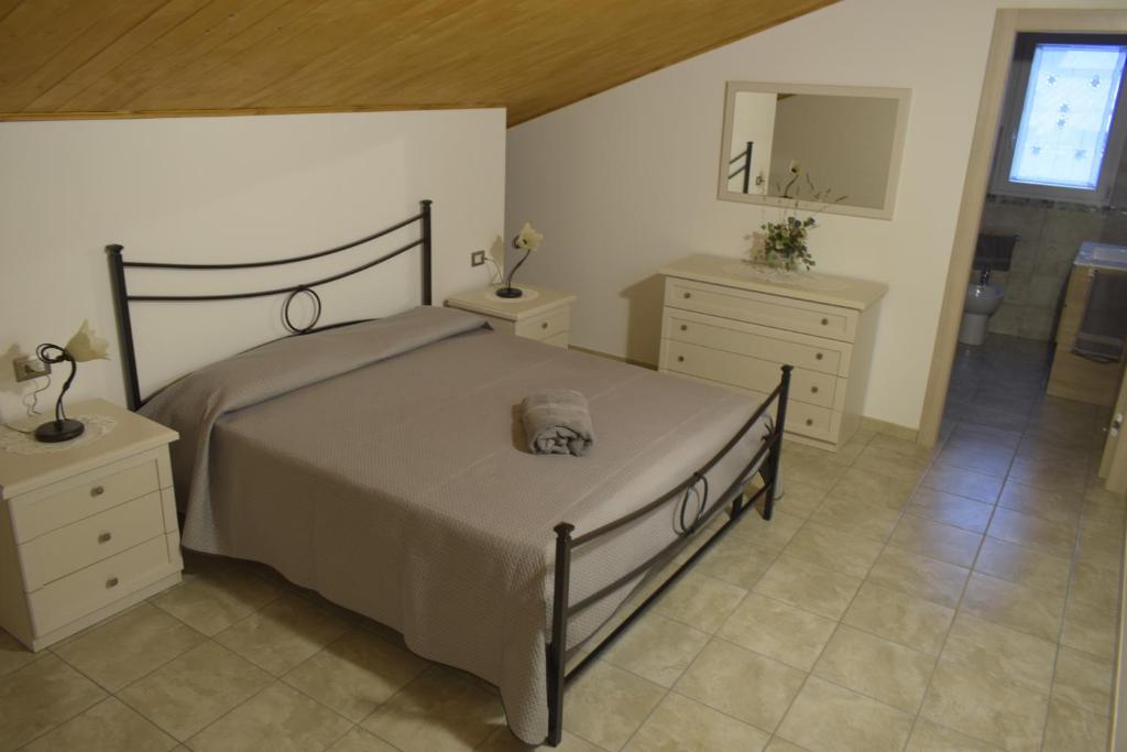Postel nebo postele na pokoji v ubytování Casa Genisi