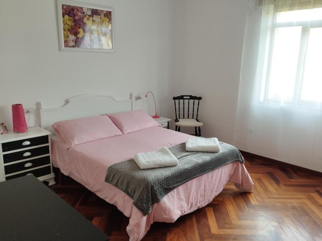 Łóżko lub łóżka w pokoju w obiekcie Villa Rica House
