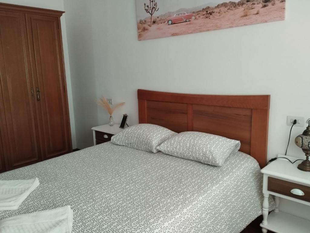 Łóżko lub łóżka w pokoju w obiekcie Villa Rica House