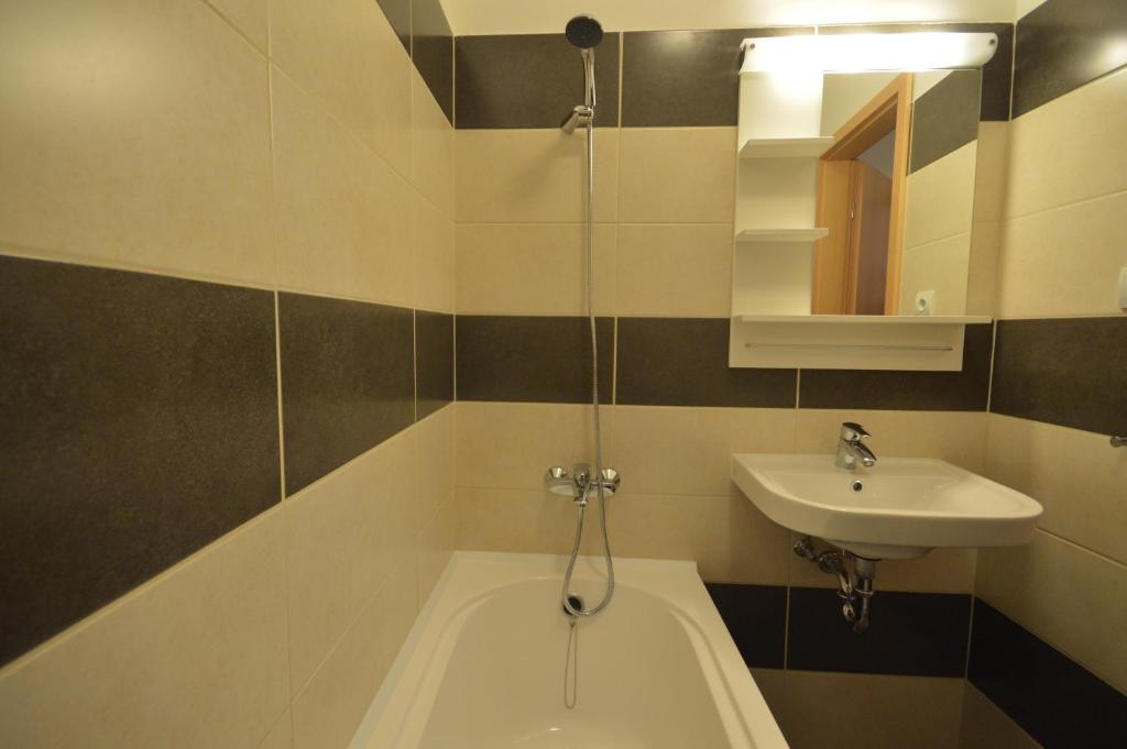 Kúpeľňa v ubytovaní Toldi Apartments Pécs